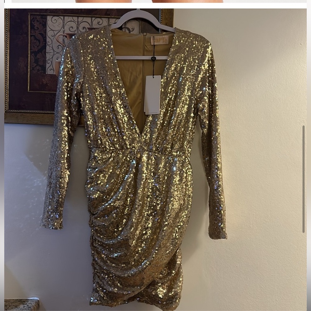 Sequin mini dress with plunge front and wrap skirt in gold
